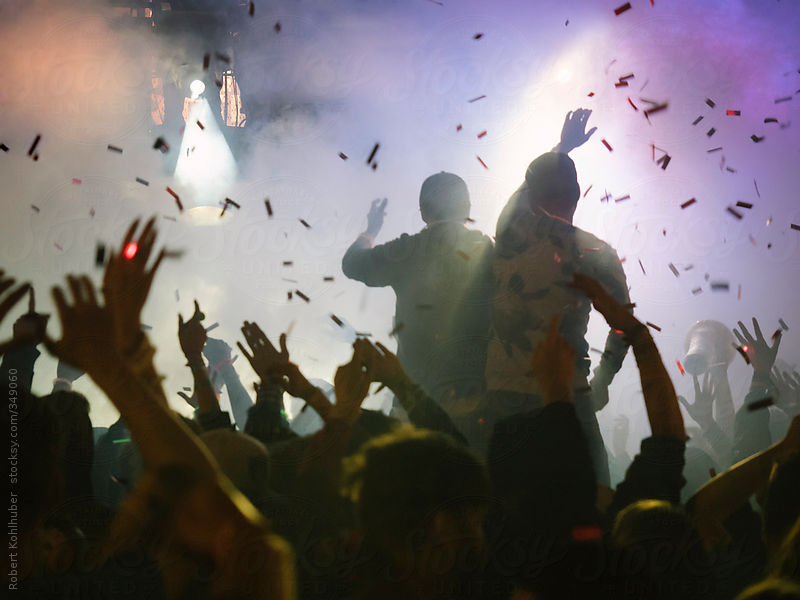 Crowd at party by Robert Kohlhuber