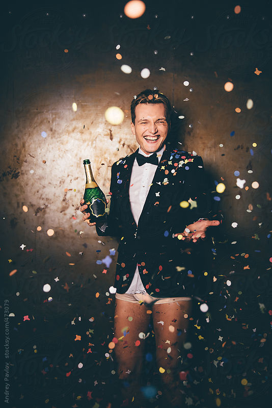 View of a man dressed in a suit and underpants through confetti by Andrey Pavlov