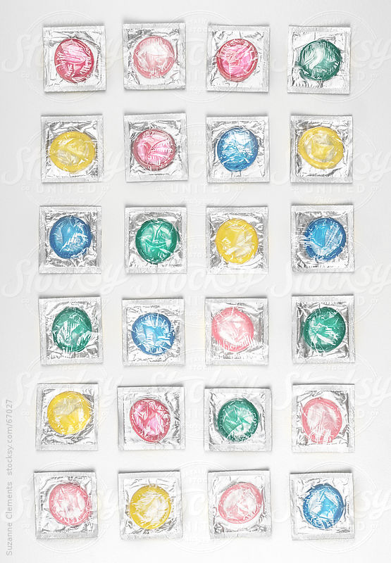 Colorful Condom Background by Suzanne Clements