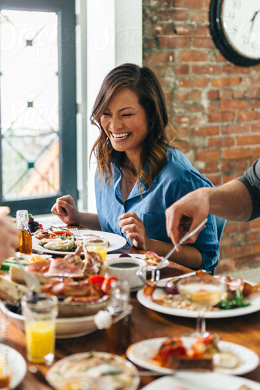 Group of friends enjoying brunch by Crustcrumbs