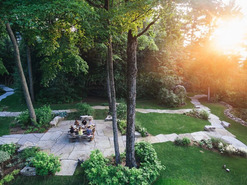 Aerial stock photo of outdoor summer feast with friends